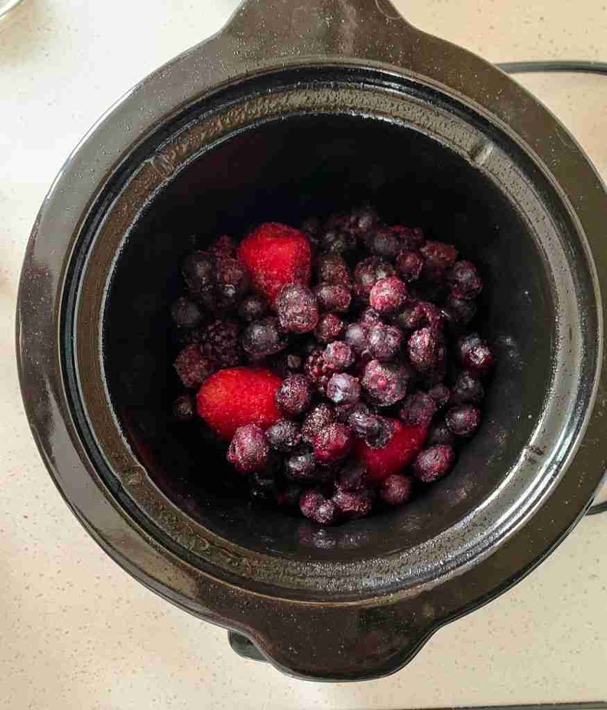 berries in a slow cooker for slow cooker berry cobbler