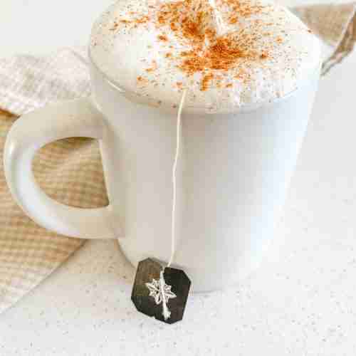 fresh cup of chai tea latte with tea bag
