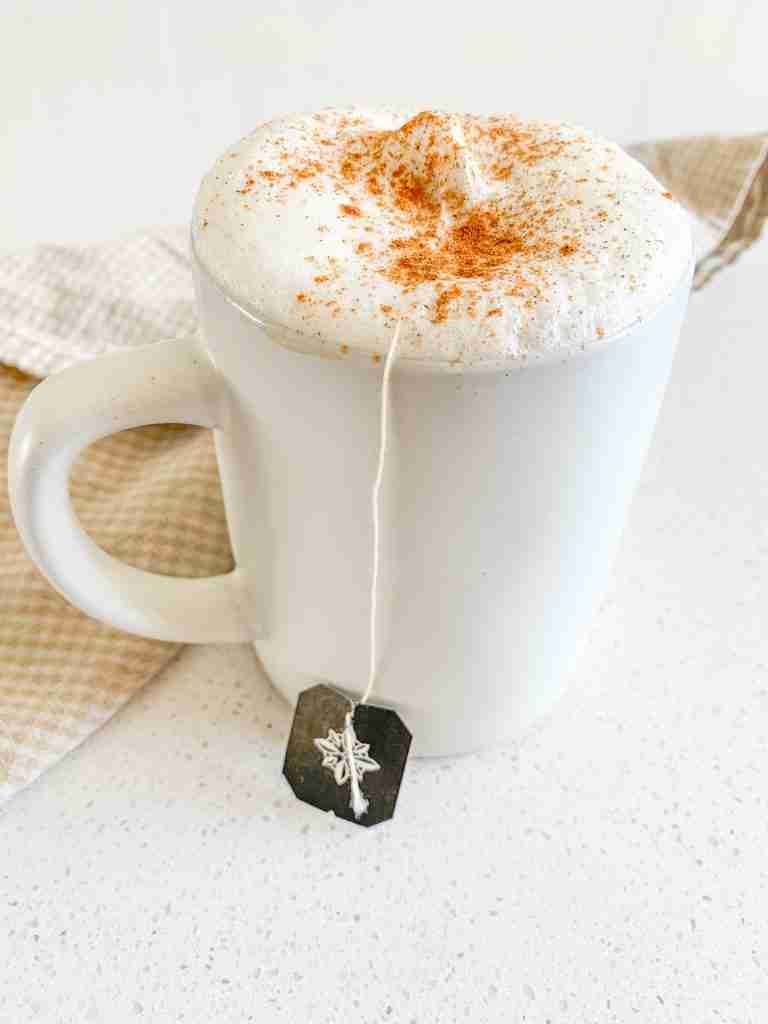 fresh cup of chai tea latte with tea bag