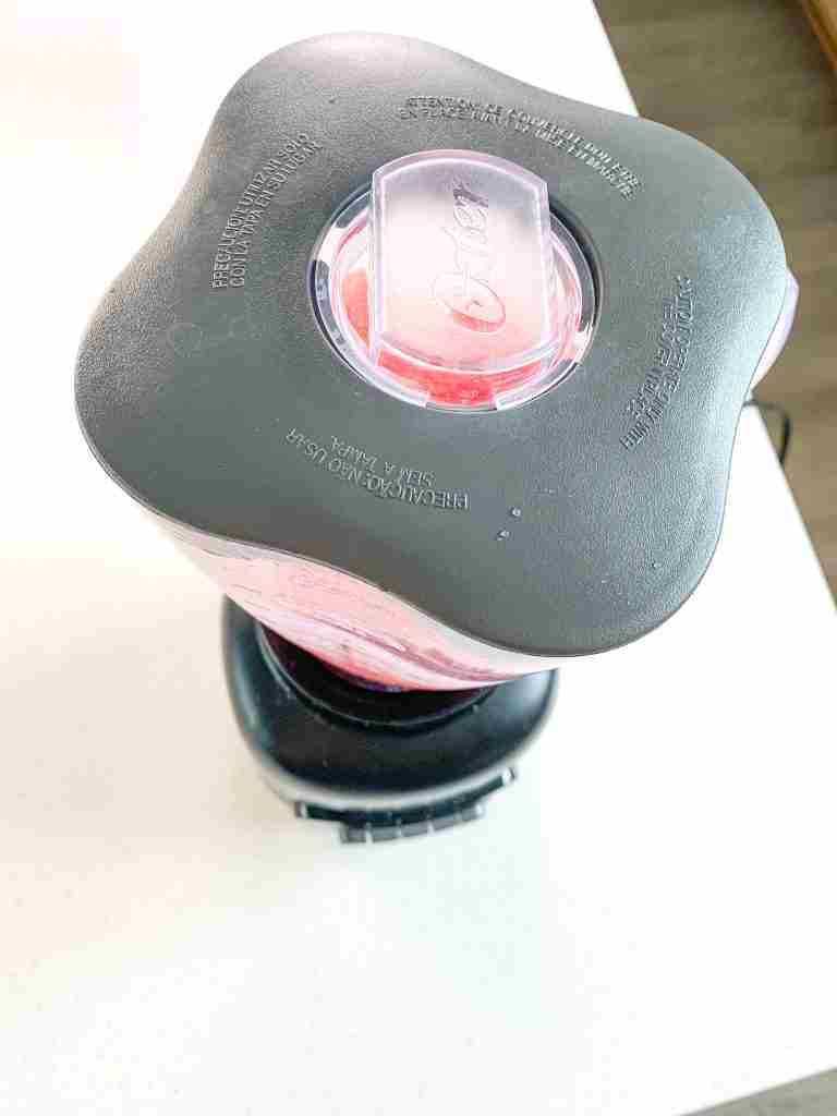 blending watermelon chunks in a blender