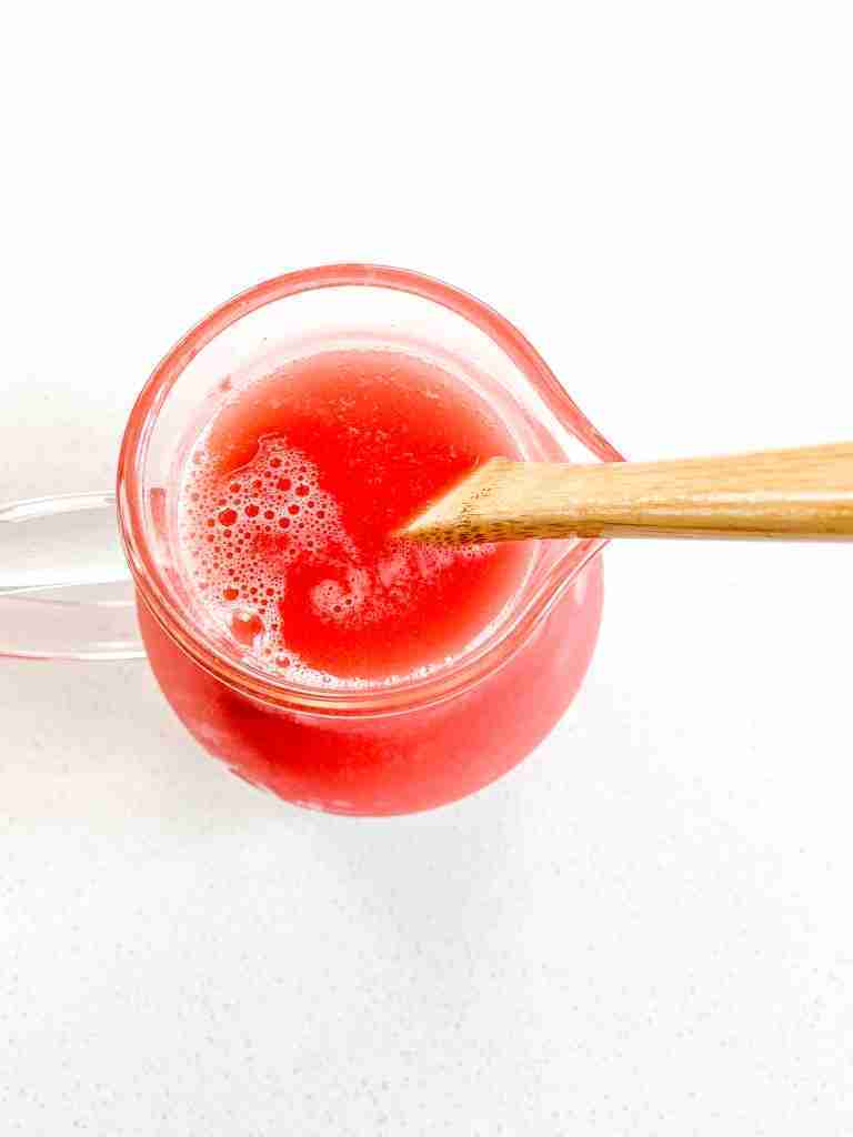 stirring watermelon lemonade ingredients