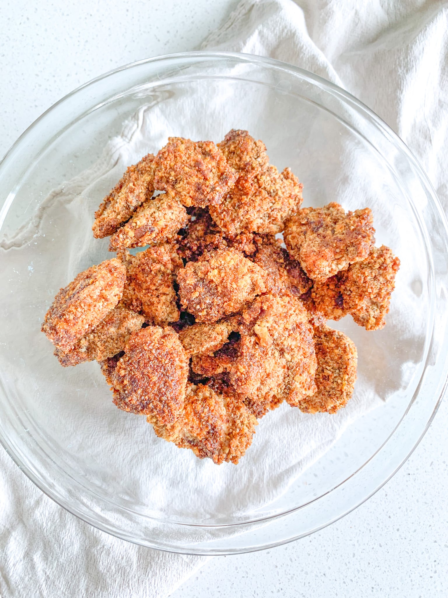 freshly made baked nashville hot chicken nuggets in a bowl