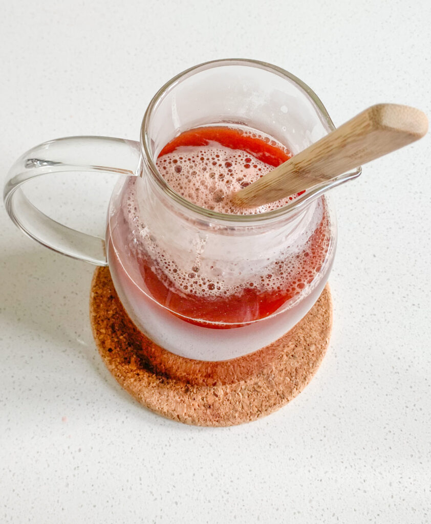 watermelon juice being mixed with tea