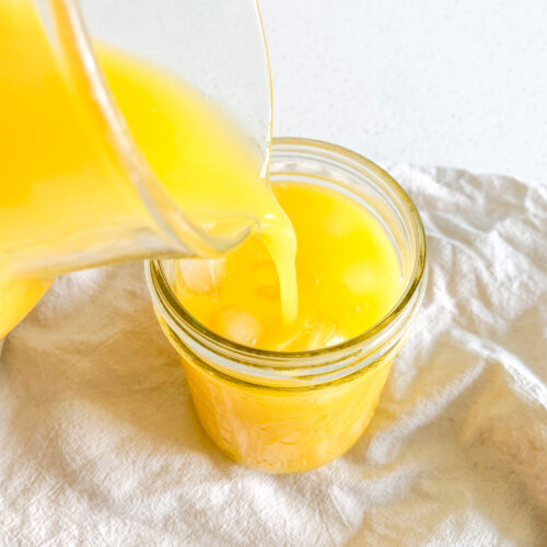 homemade mango lemonade being poured