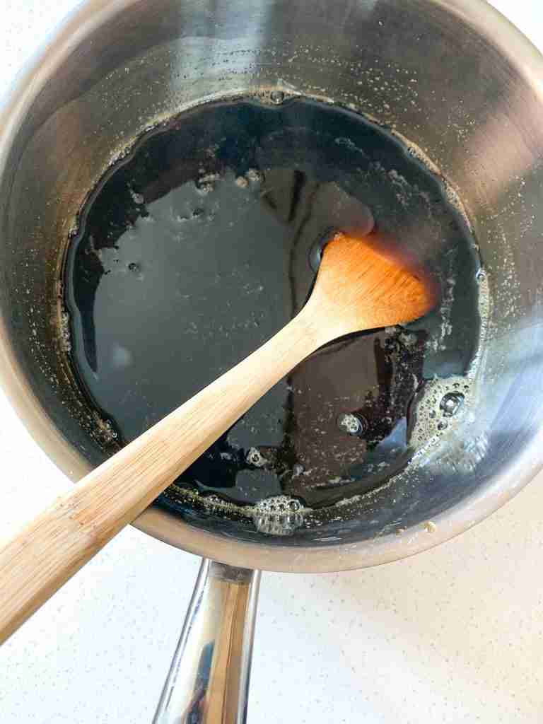 sugar getting stirred into tea