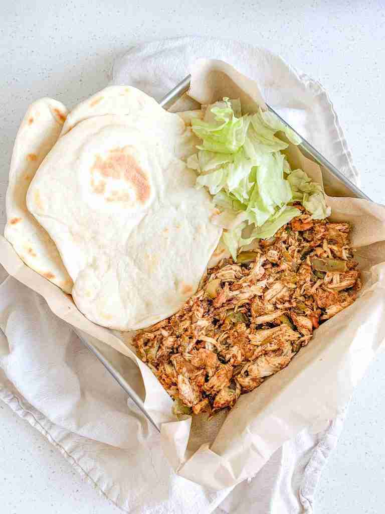 freshly cooked and plated slow cooker chicken fajitas
