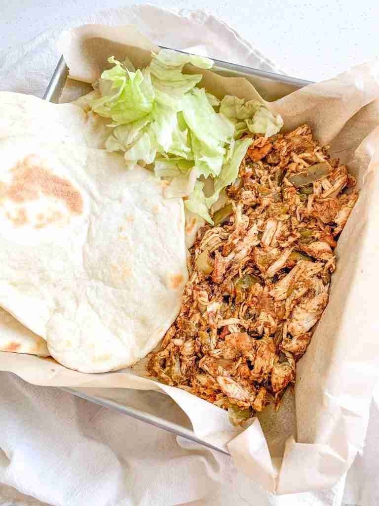 freshly cooked and plated slow cooker chicken fajitas