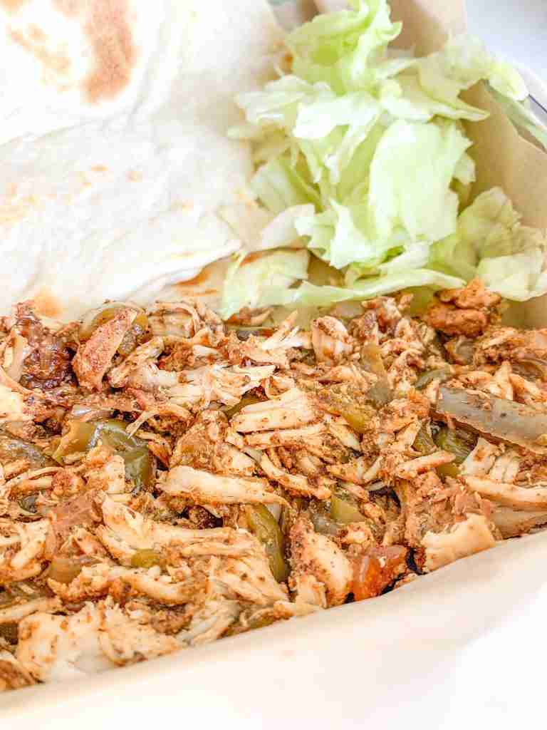 freshly cooked and plated slow cooker chicken fajitas