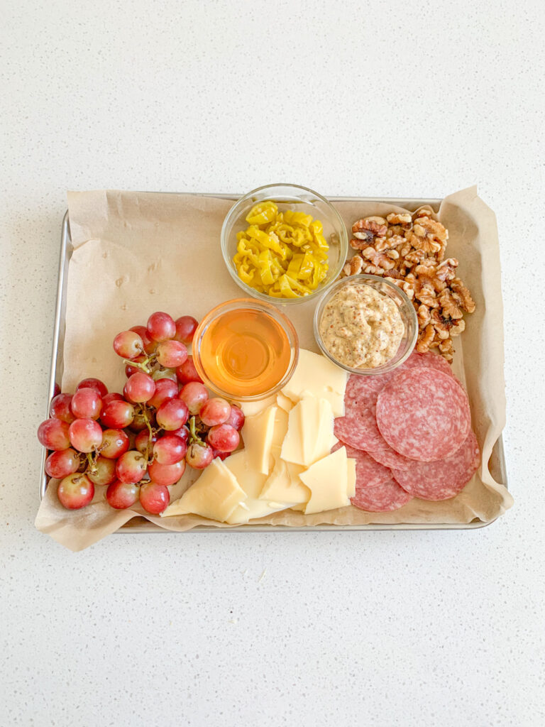 pepperoncini peppers added to charcuterie board