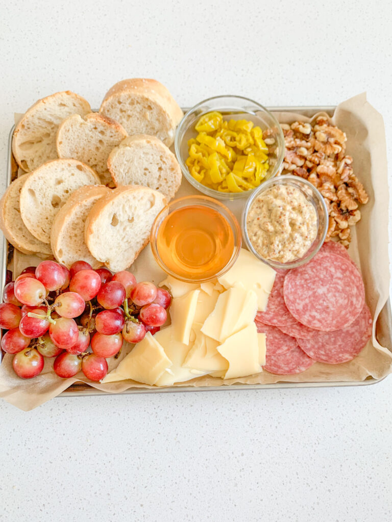 french bread added to charcuterie board