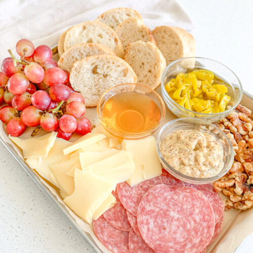 assembled simple charcuterie board ready to be enjoyed
