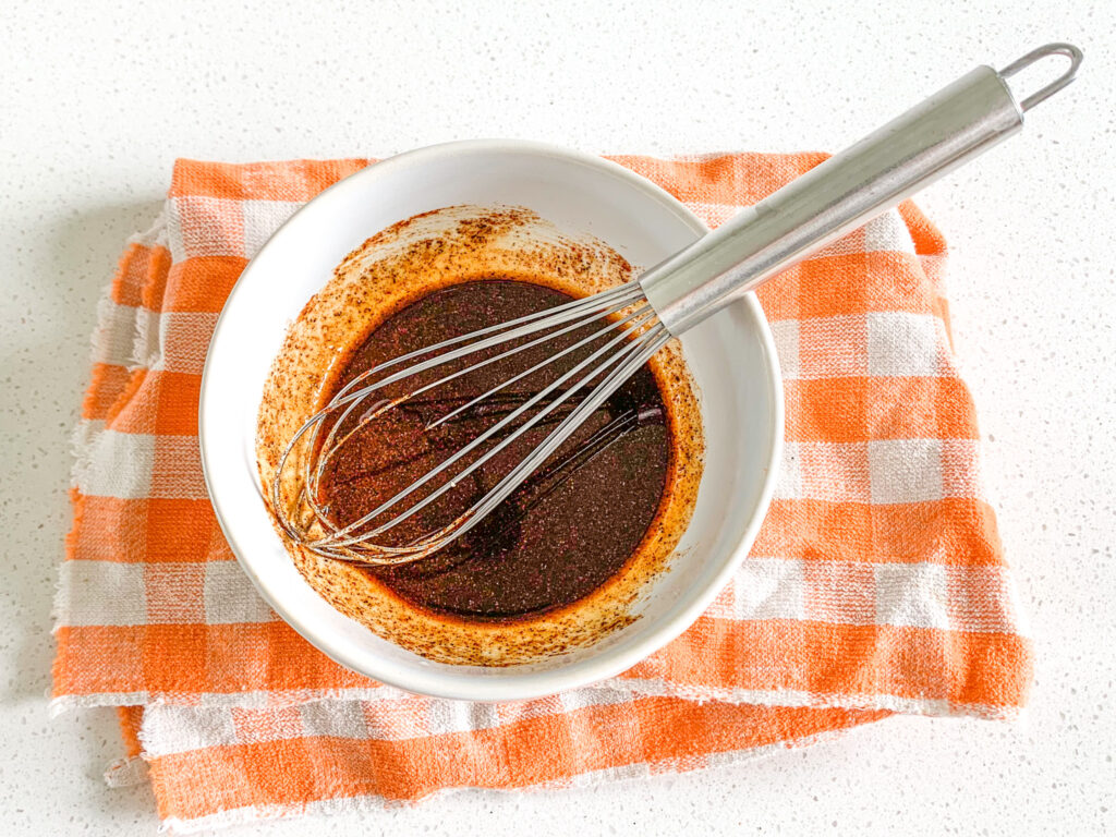 whisking Nashville Hot Chicken seasoning