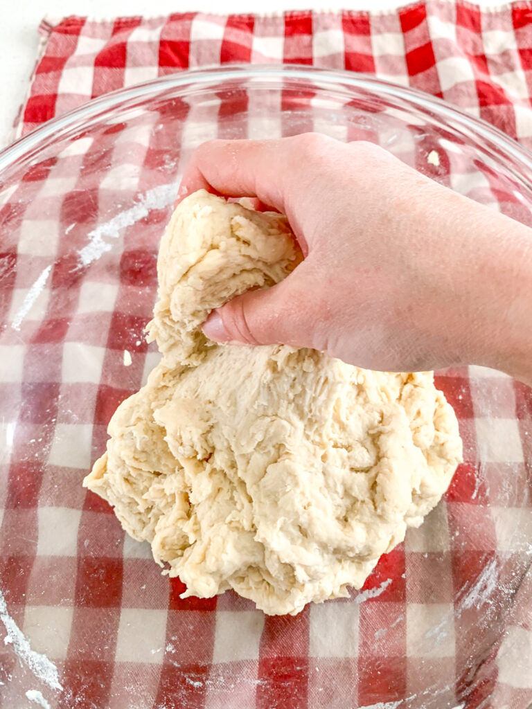 stretch and folding sourdough bread dough