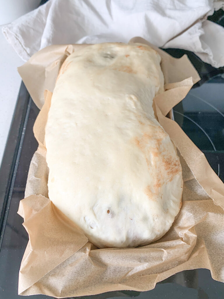 sourdough cinnamon raisin loaf risen and ready for baking