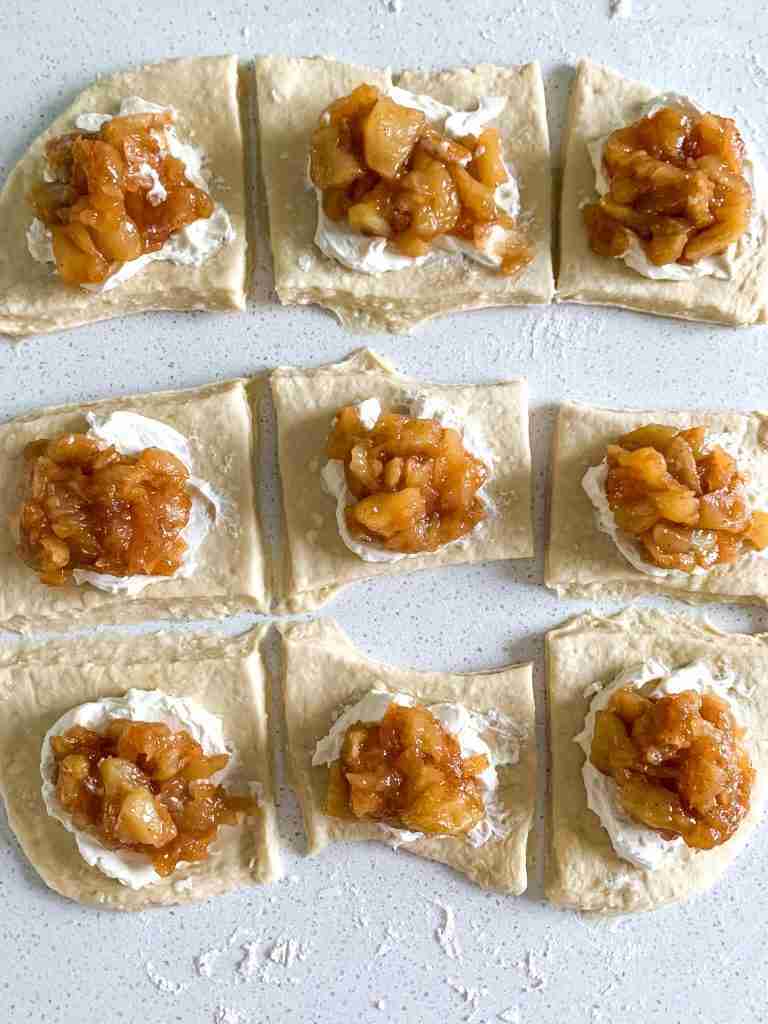 apple and cream cheese topped pastry dough