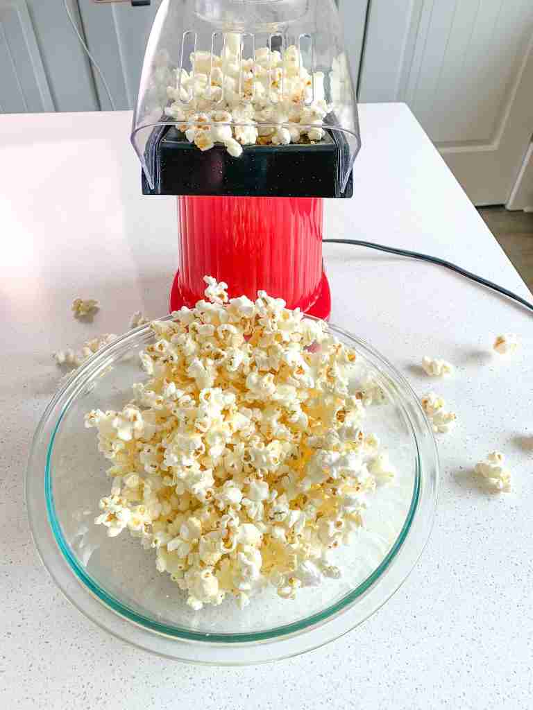 popcorn popping in an air popper