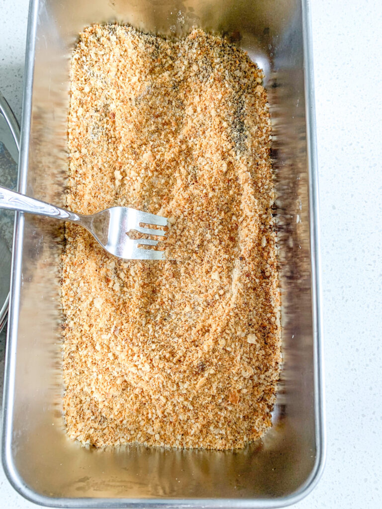 mixing breadcrumb mixture for breading