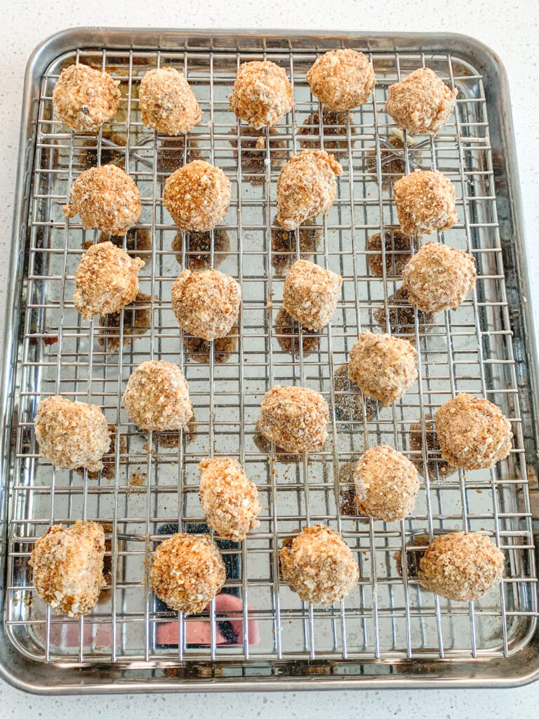 freshly breaded mozzarella balls ready for chilling
