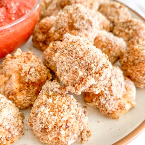 freshly baked mozzarella balls with marinara sauce