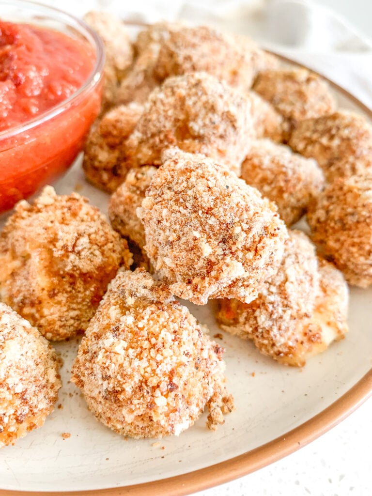 freshly baked mozzarella balls with marinara sauce