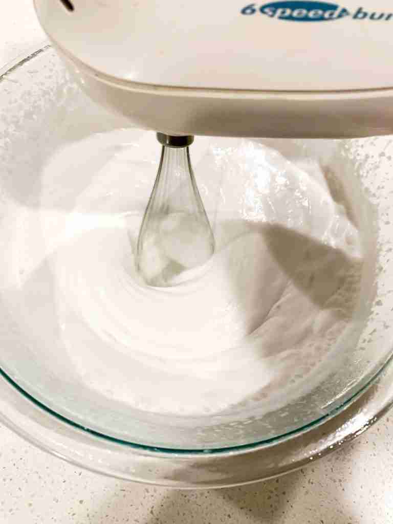 hand mixer whipping coconut milk
