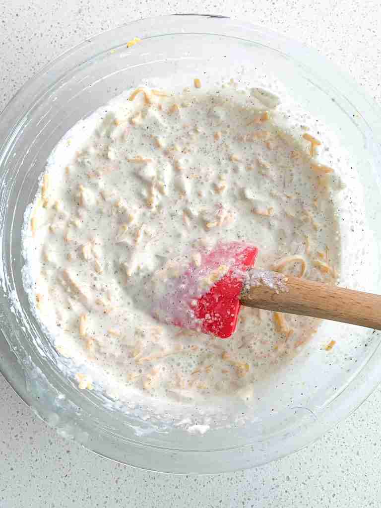 mixing wet ingredients for hashbrown casserole