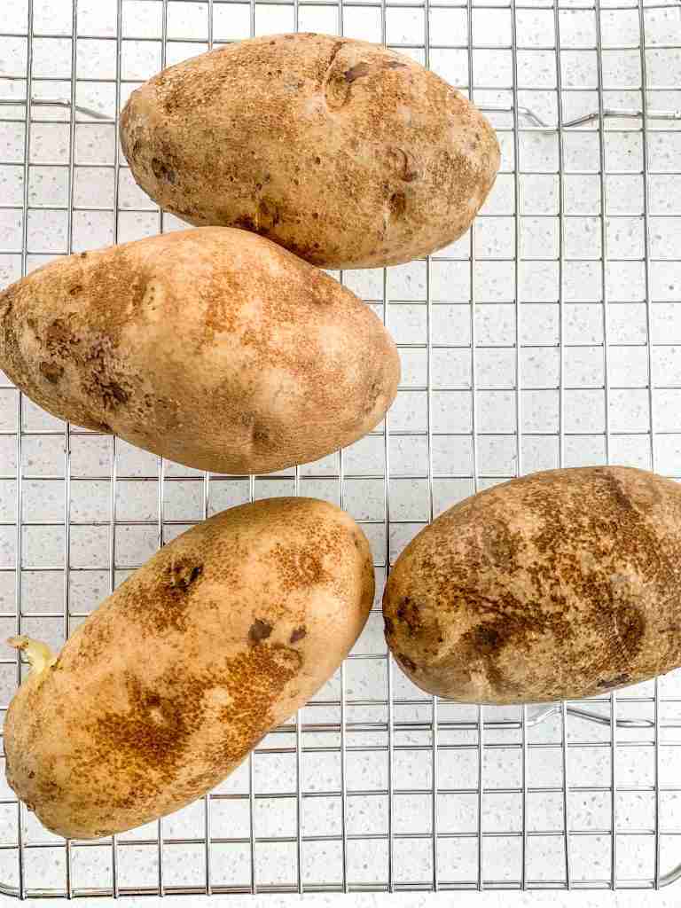 cooked potatoes cooling before adding into casserole