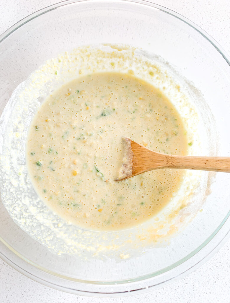jalapeno corn casserole with sourdough batter mixed up in a bowl