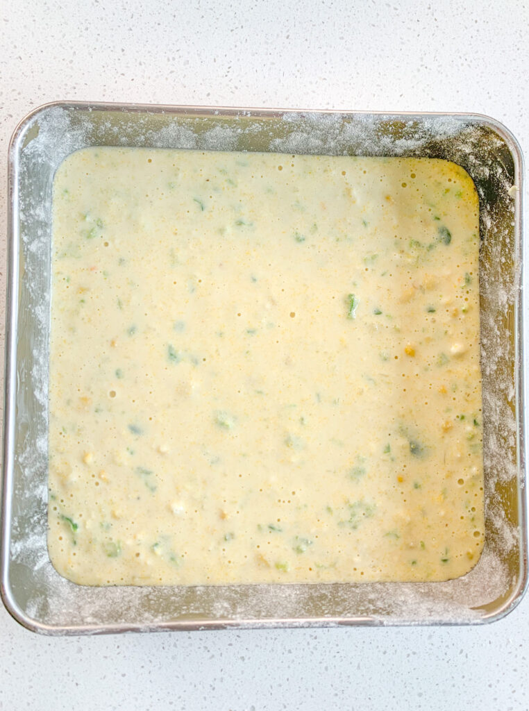 jalapeno corn casserole batter in prepared baking pan