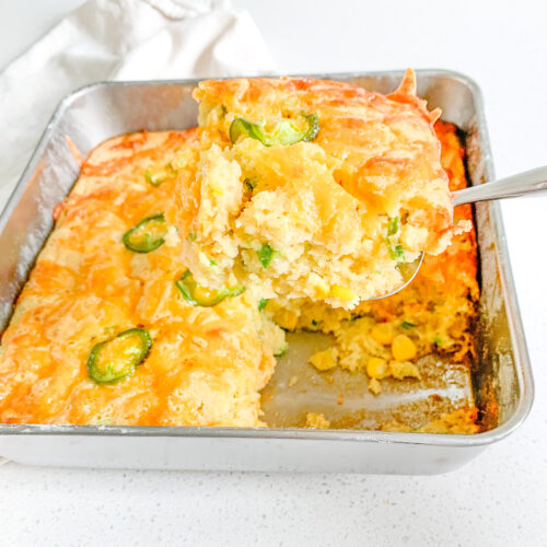 freshly baked cheesy sourdough jalapeno corn casserole getting served