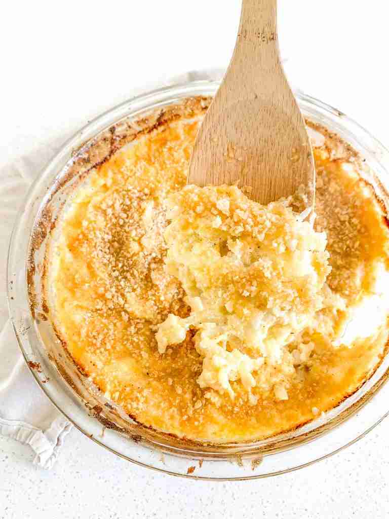 spoonful of freshly made cheesy hashbrown casserole