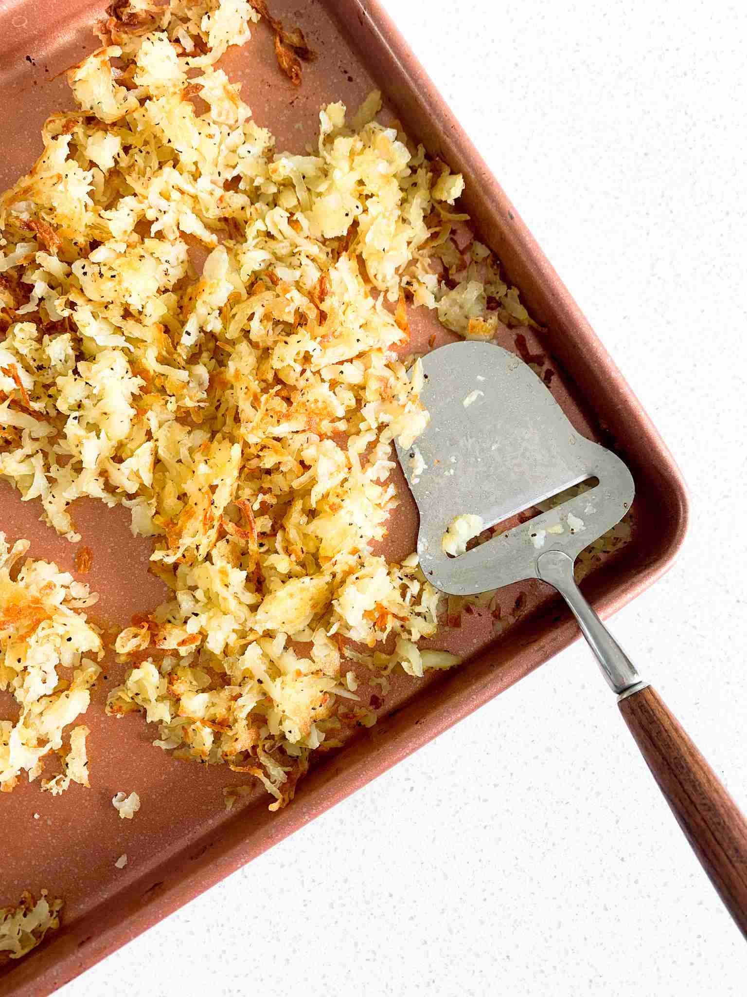 pan of potatoes shredded