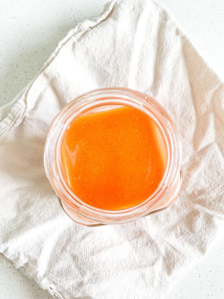 Freshly made homemade buffalo sauce with Frank's red hot