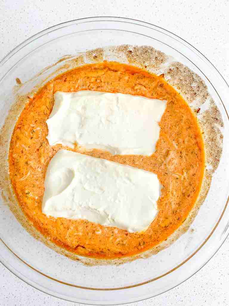 cream cheese on top of buffalo chicken dip