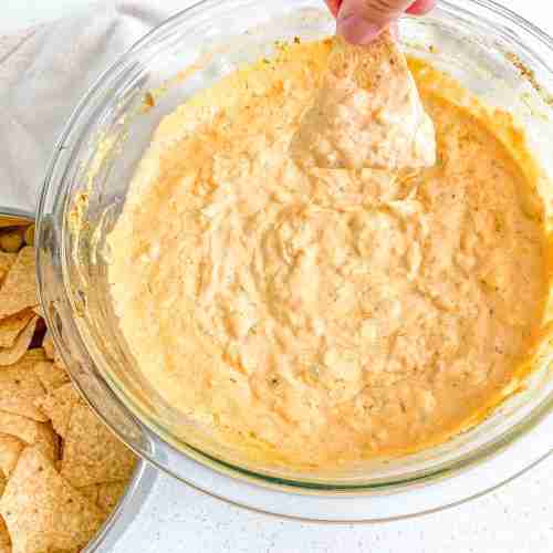freshly made buffalo chicken dip with tortilla chips