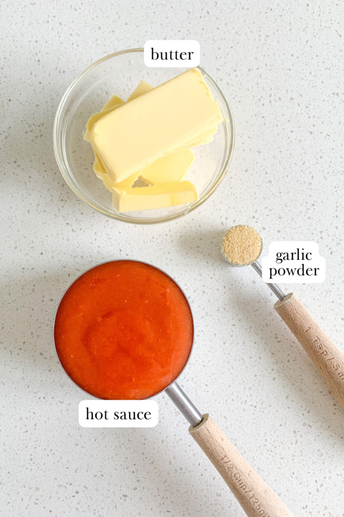 labeled ingredients for homemade buffalo sauce with frank's red hot