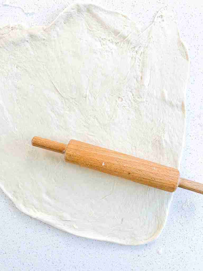 rolled out pizza crusts