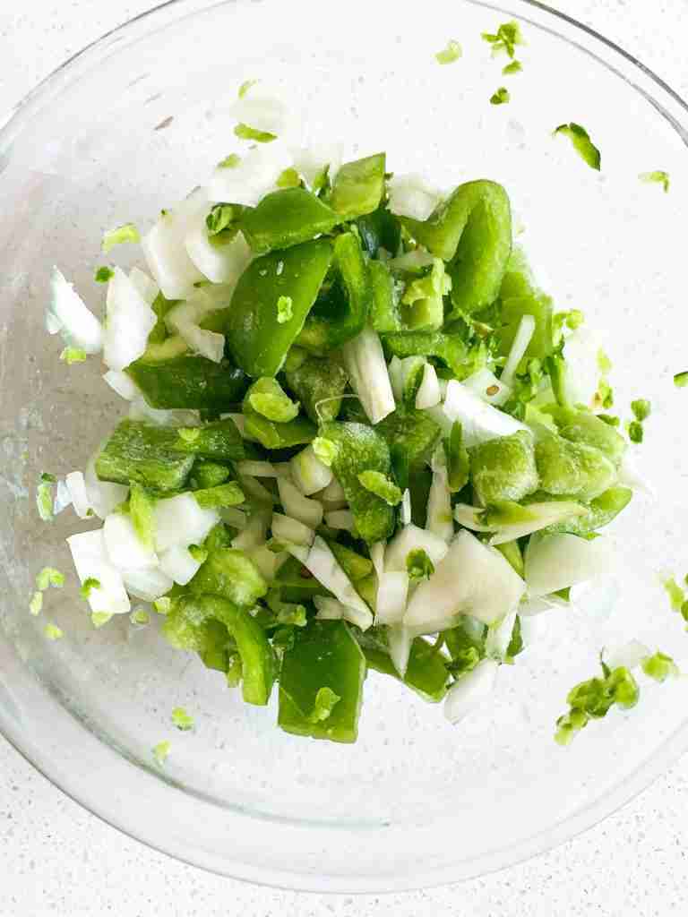 diced jalapeno, peppers, and onions in a bowl