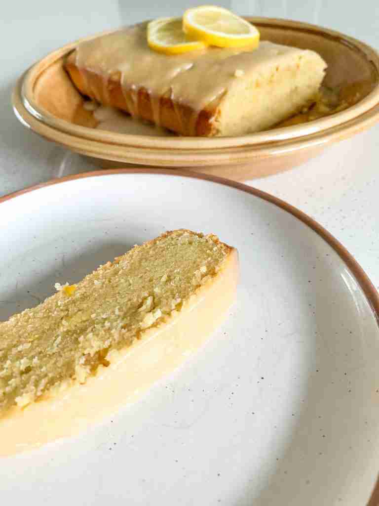 slice of cake beside the lemon loaf