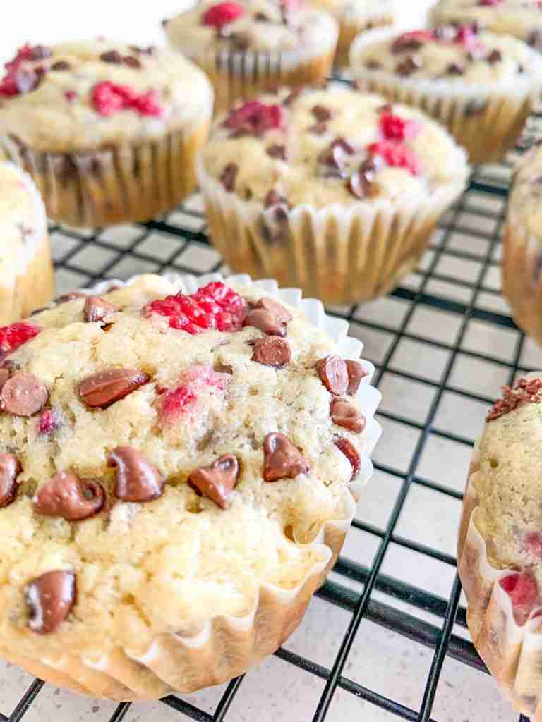 close up photo of muffins with berries and chocolate