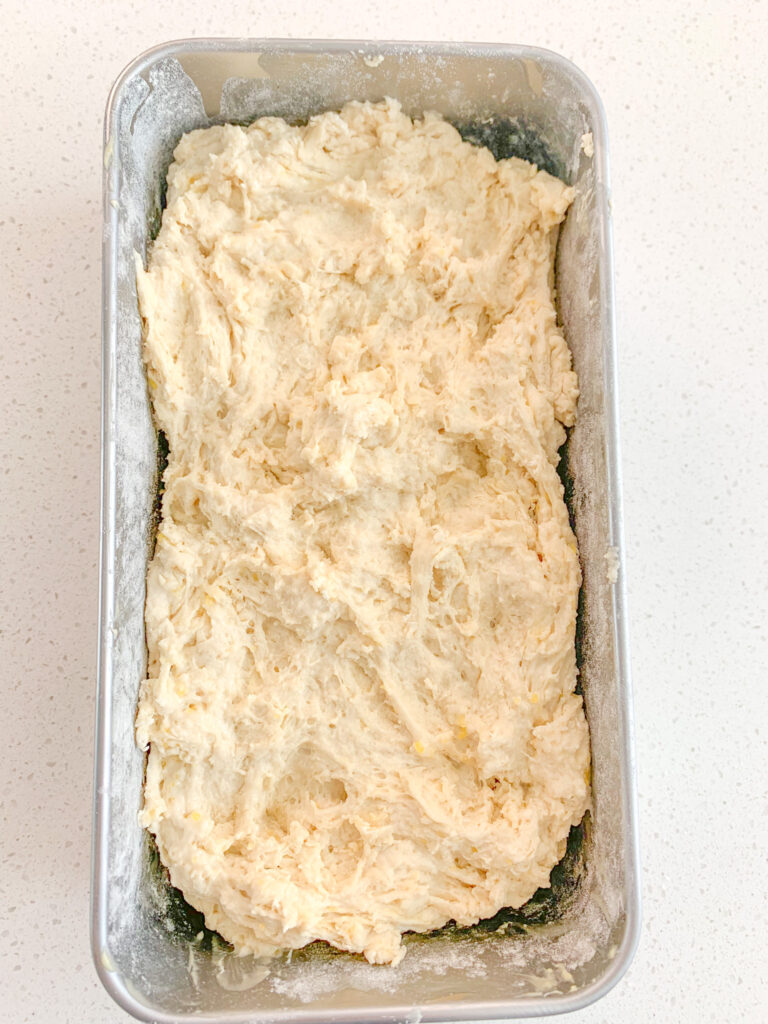 beer bread dough in a pan ready for baking
