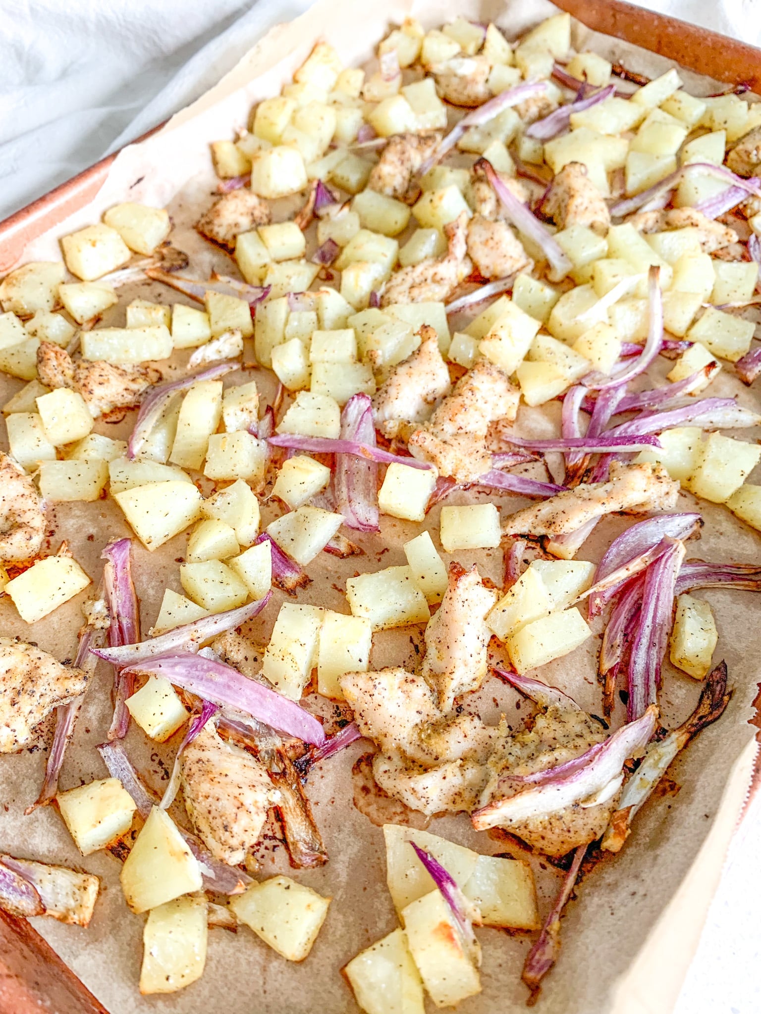 freshly baked sheet pan lemon chicken and potatoes meal