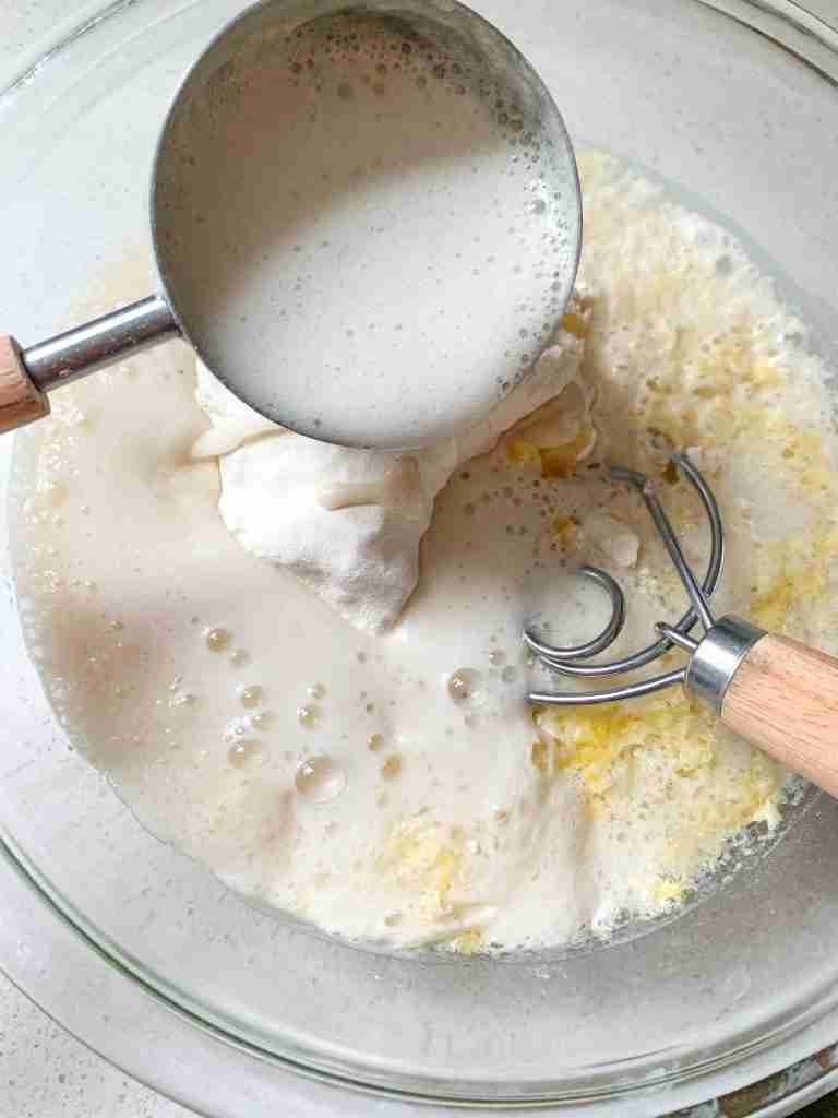 ingredients being added into a bowl and mixed