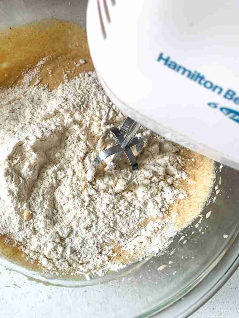 flour added into the batter with an electric mixer