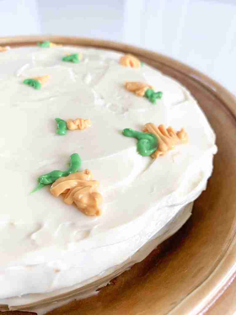 carrots pipped on with frosting as decoration