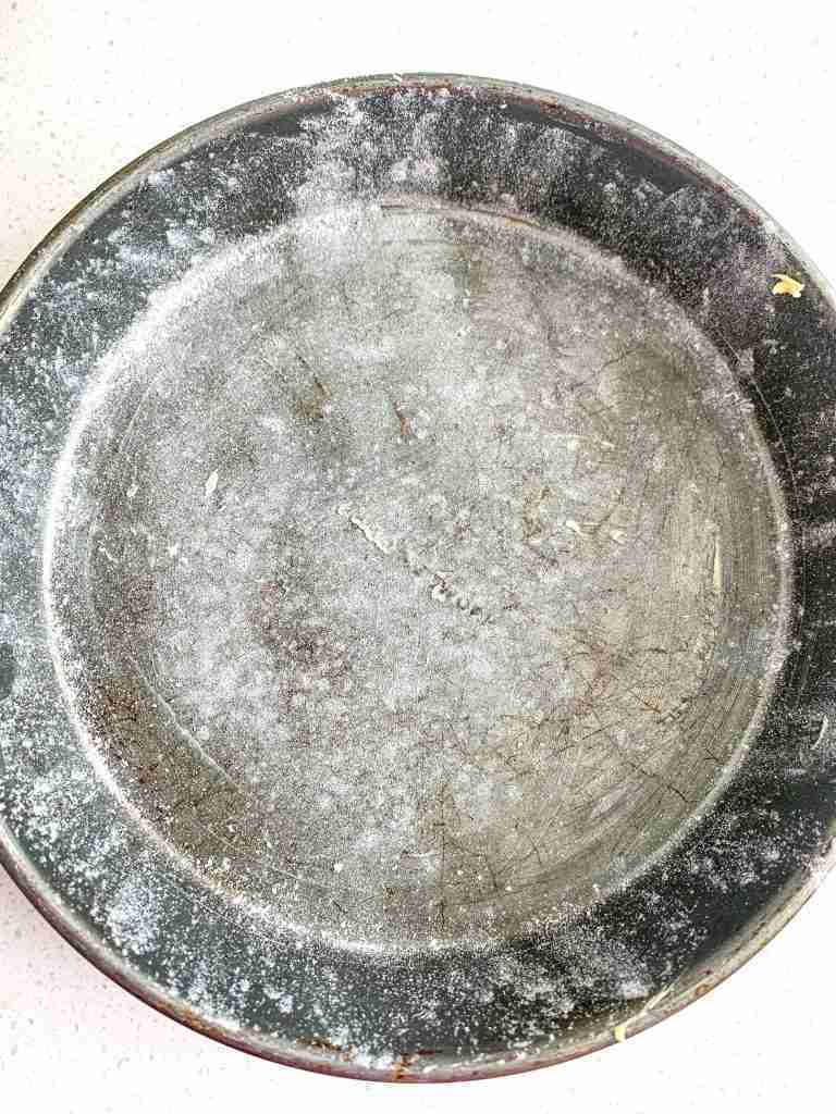 flour dusted cake pan