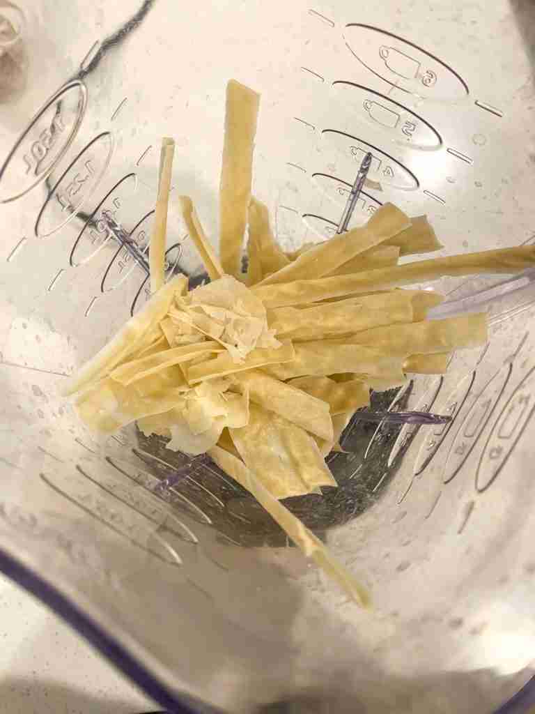 pieces of dried starter in a blender