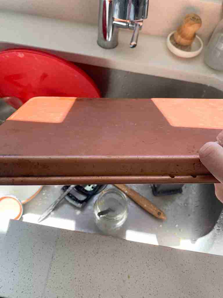 upside down baking sheet getting the flour off of it