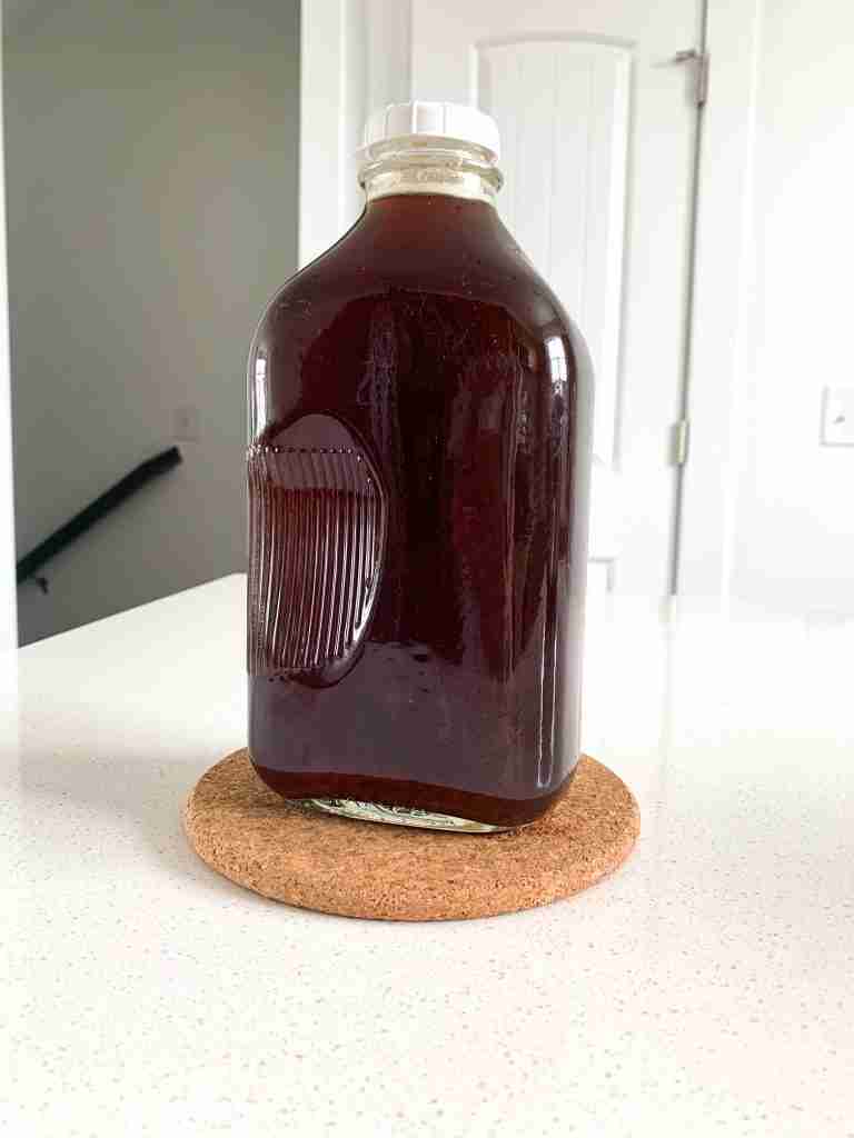 large bottle of tea on the counter