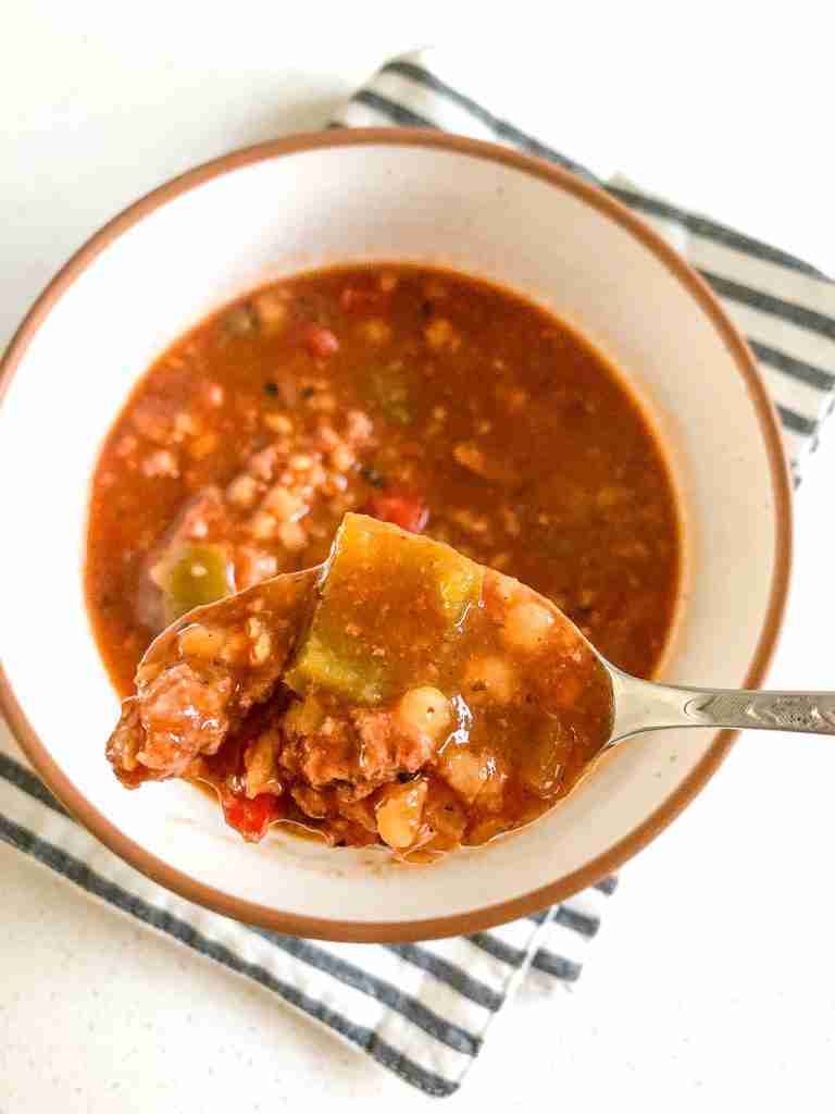 bowl of soup with a spoonful